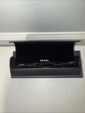 Prada Silver and Black Rectangular 53-17-135
AP8790875 original.
